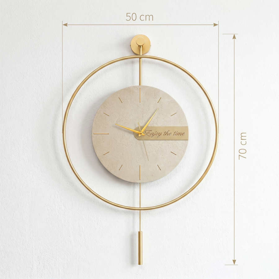 Horloge dorée balancier