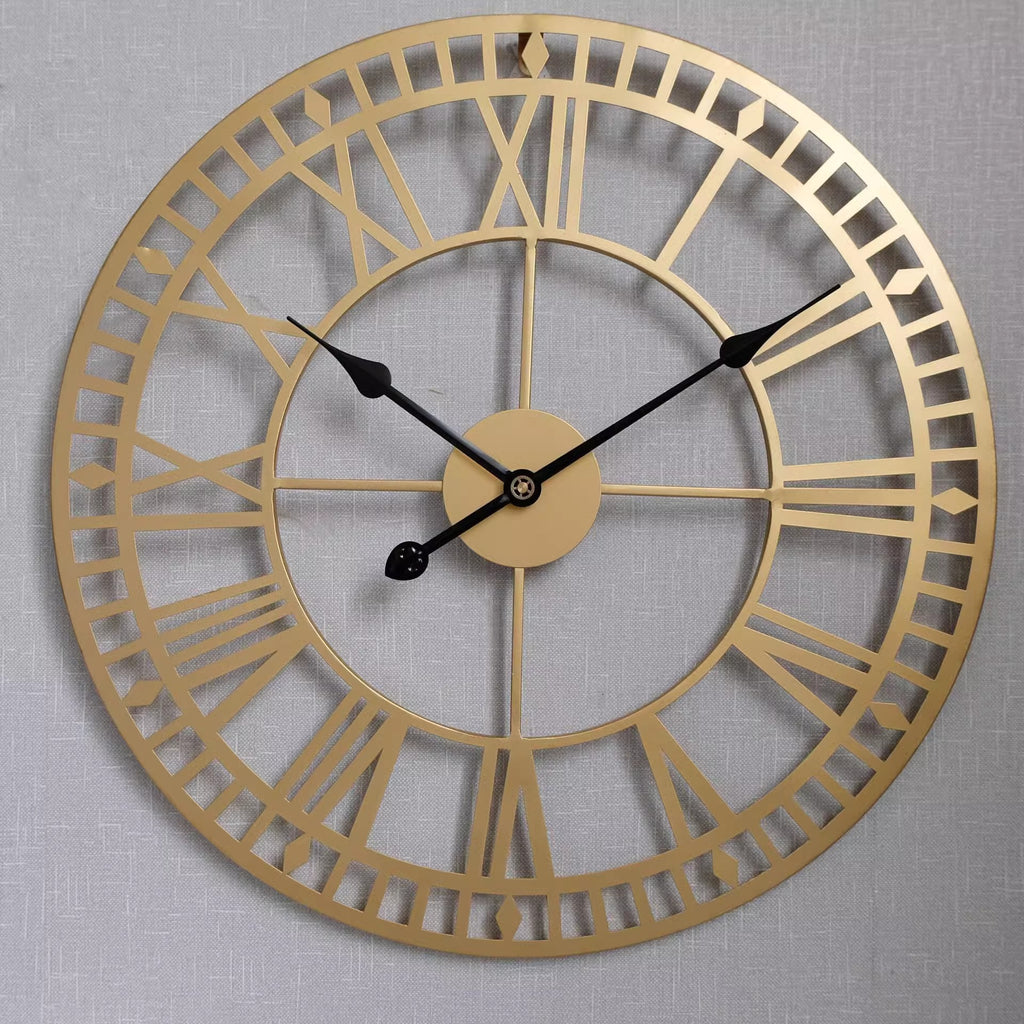Horloge murale dorée