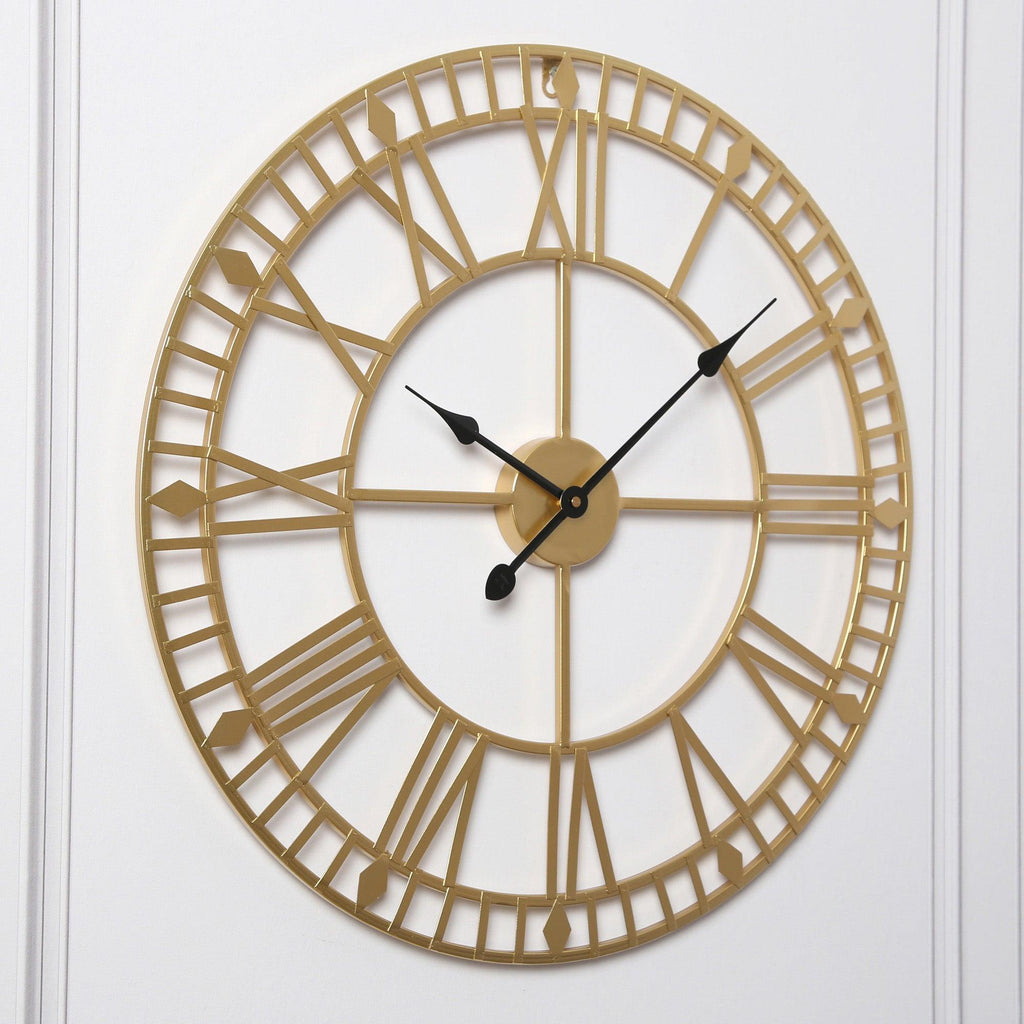 Horloge murale dorée