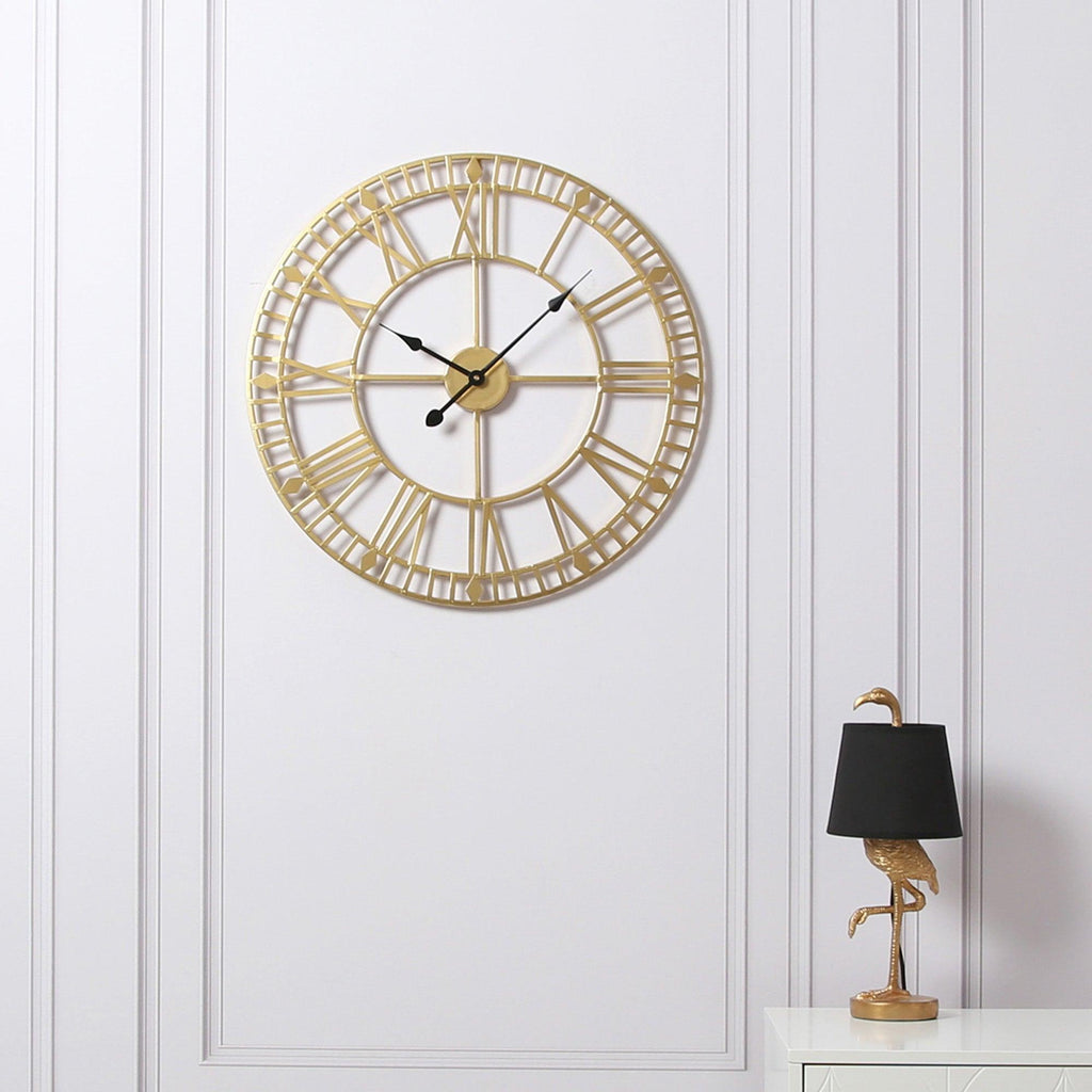 Horloge murale dorée