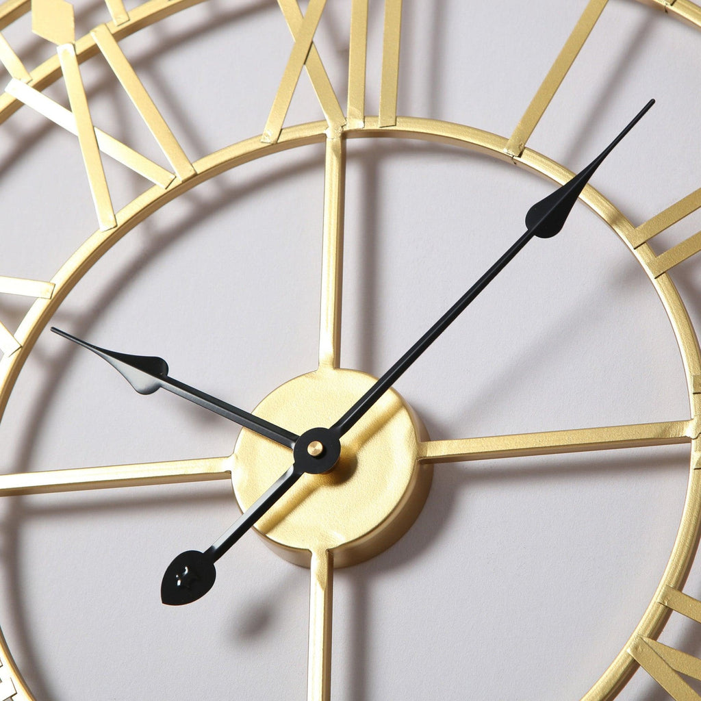 Horloge murale dorée