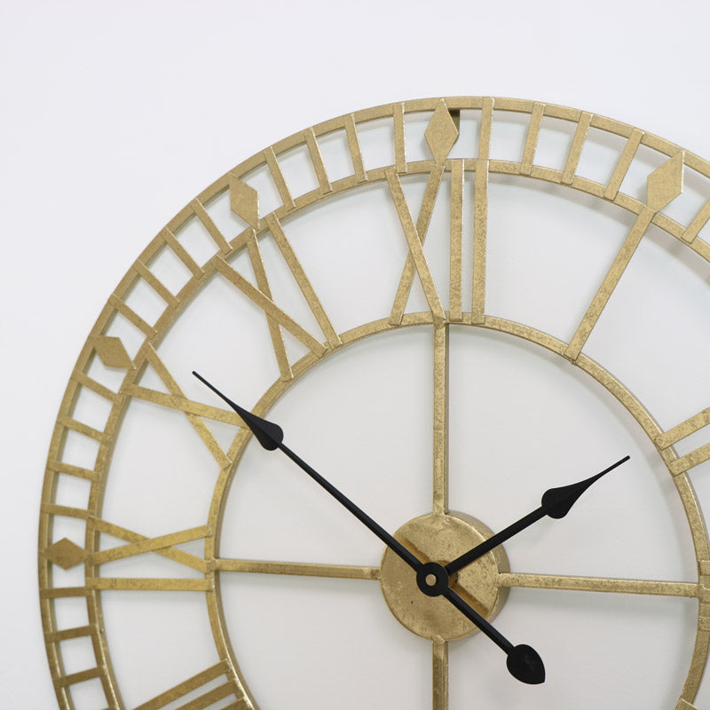 Horloge murale dorée